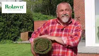 Gardening expert David Hurrion holding Rolawn turf