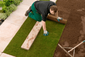 A garden being turfed a new lawn